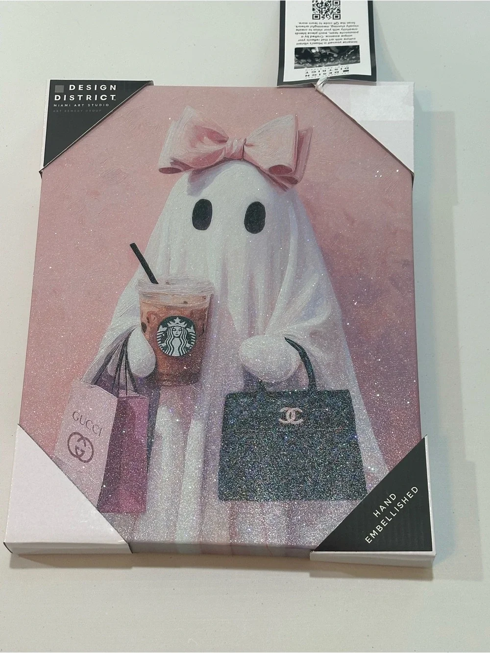 Viral Ghost Wall Art with pink bow coffee and purse